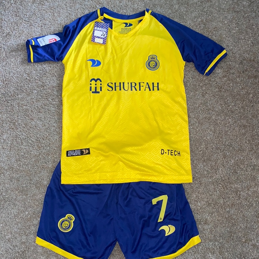 Ronaldo 7 Al nassr football club NWT size 24 jersey & shorts